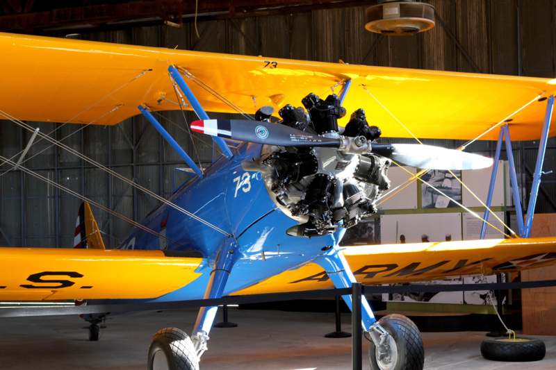 a blue and yellow airplane