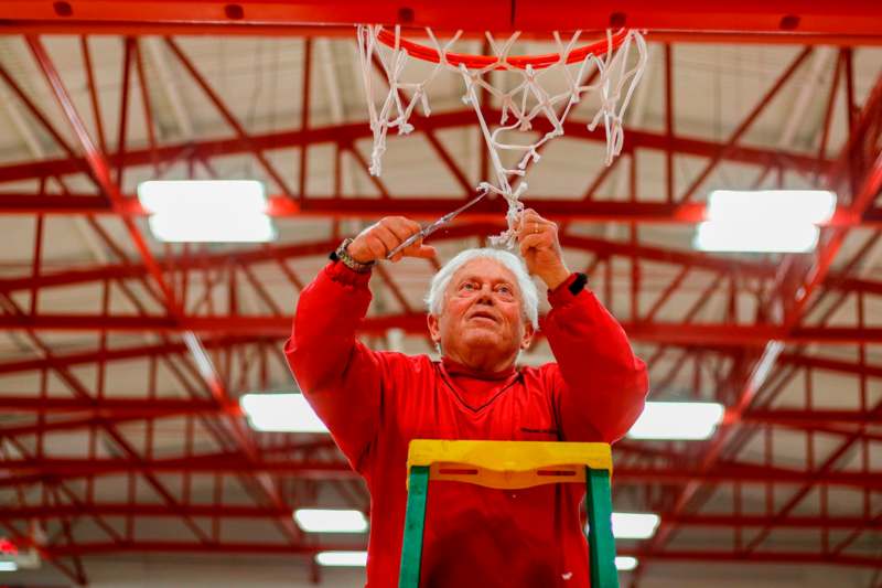 an older man a basketball hoop