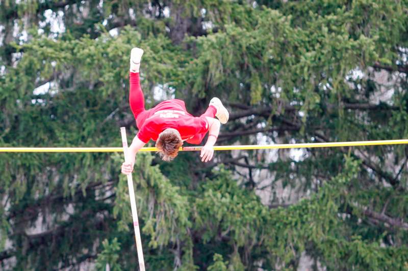 a person in red doing a high jump