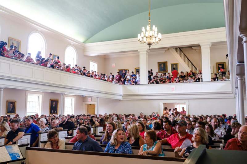 a large group of people in a church