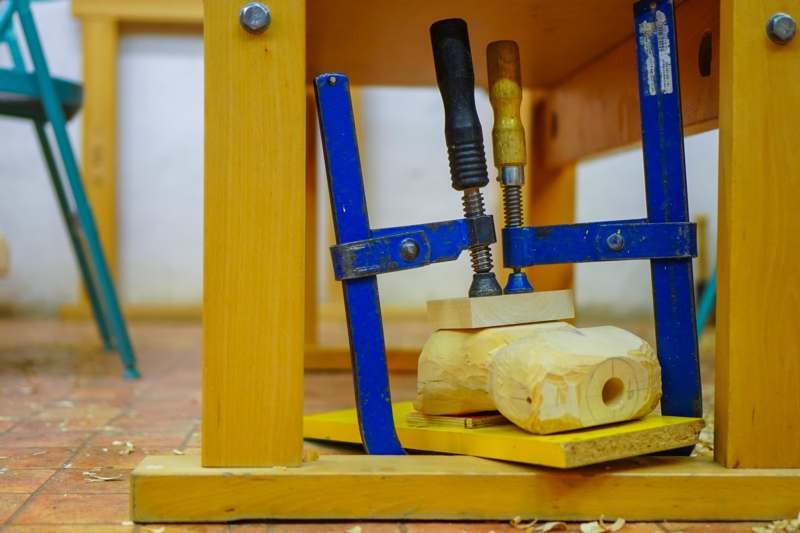 a woodworking clamp with screws