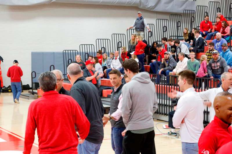 a group of people in a gym