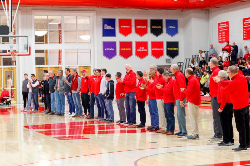 a group of people standing in a line