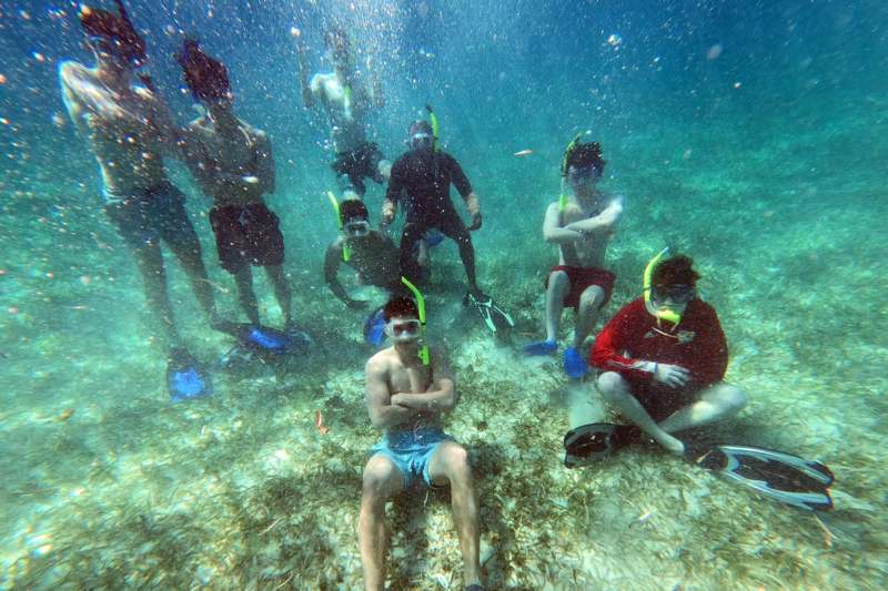 a group of people under water