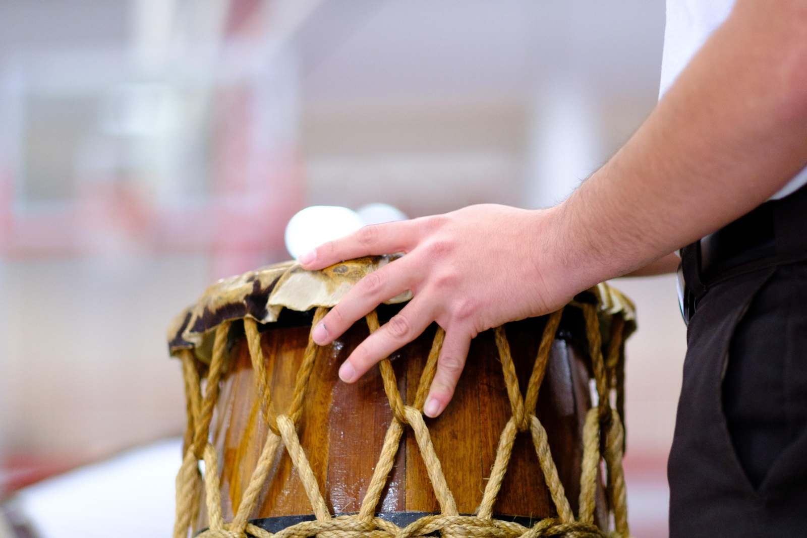 a hand on a drum