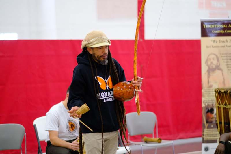 a man holding a bow and arrow