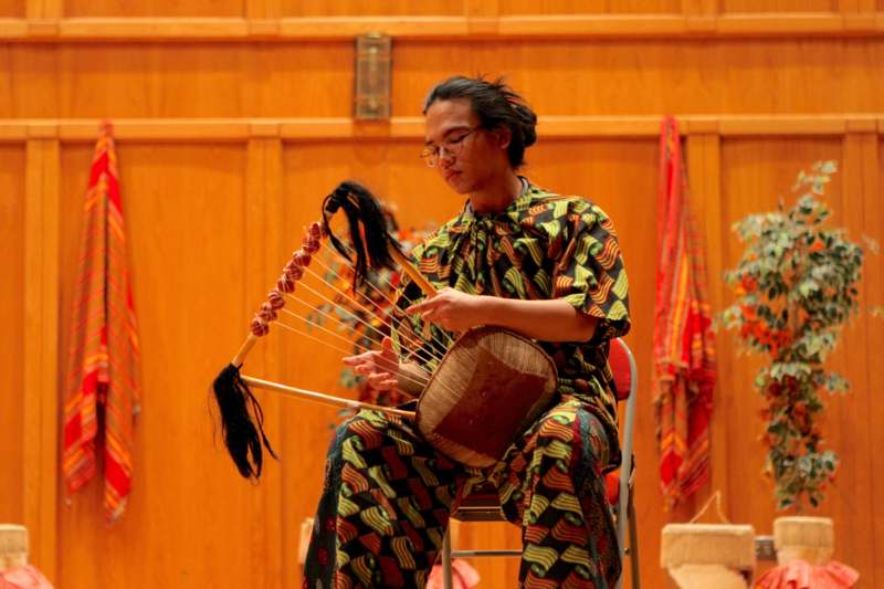 a man playing a musical instrument