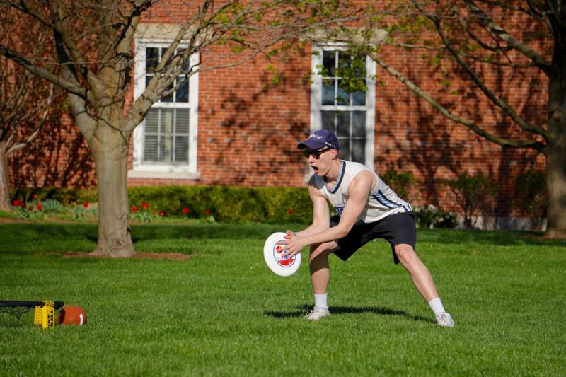 a man holding a frisbee