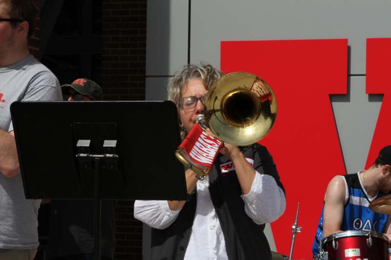 a woman playing a trumpet