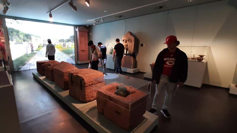 Students view Roman tombs excavated in Heidelberg, Germany