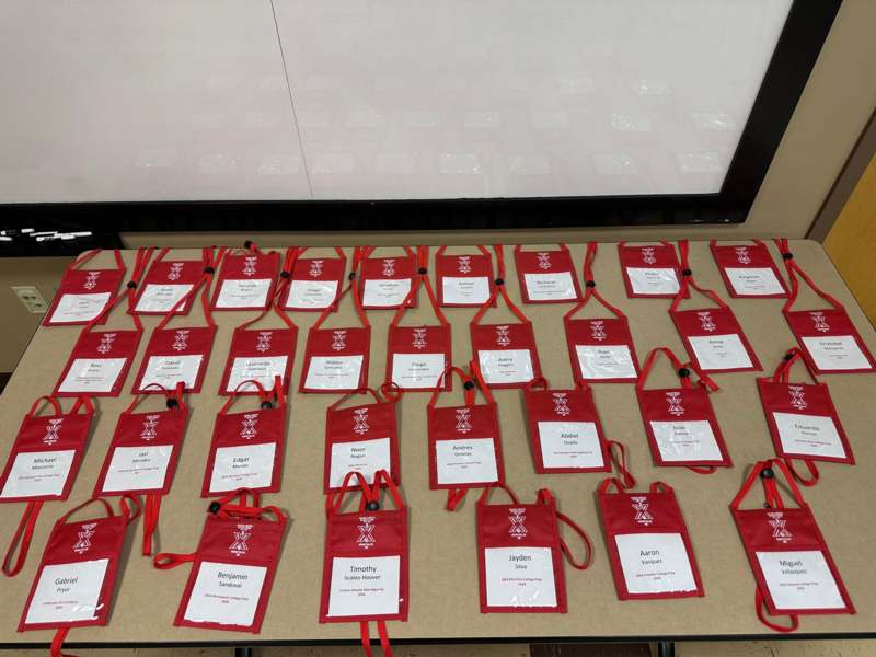 a group of red bags with white text on them