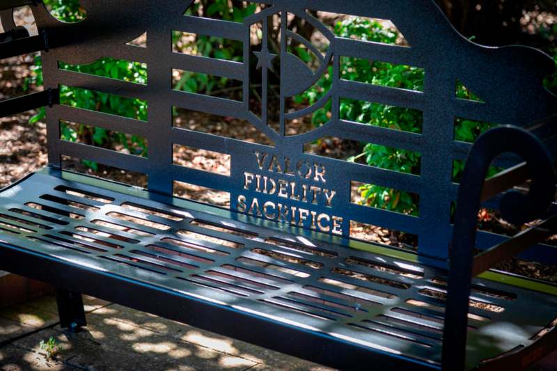 a bench with a name on it