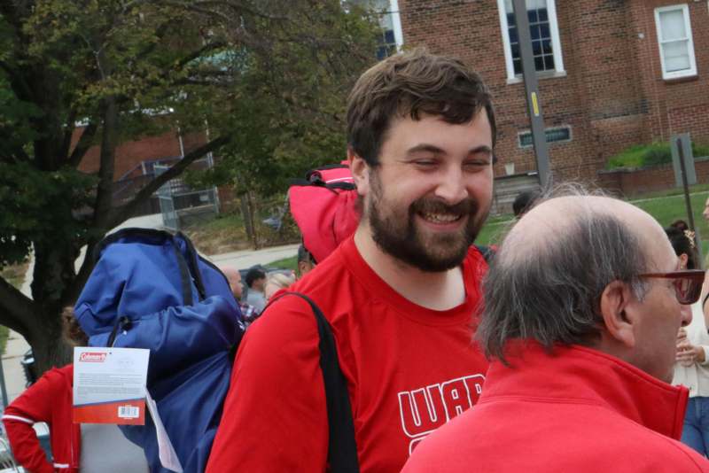 Two Wabash College alumni share a laugh