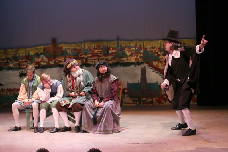 a group of people on a stage