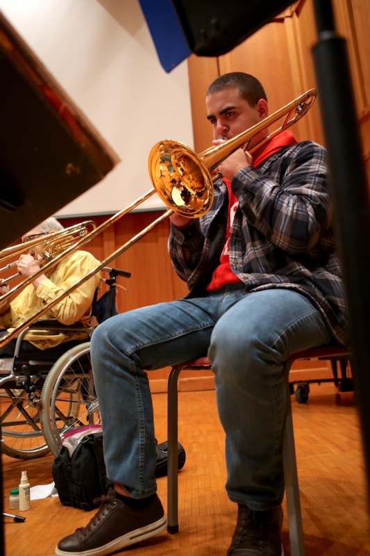 a man playing a trombone
