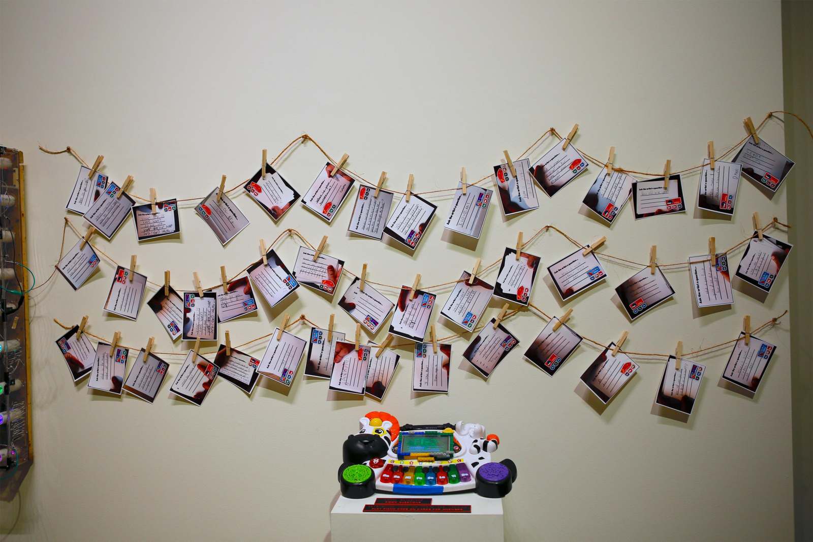 a group of pictures on a string