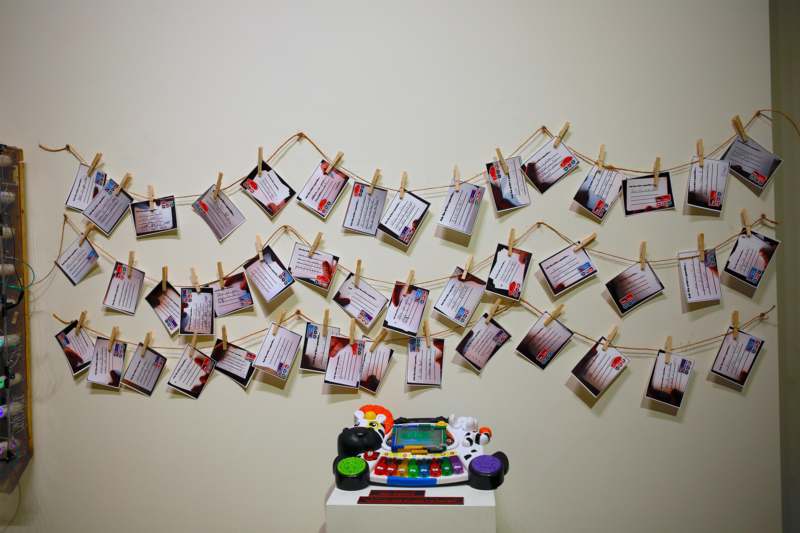 a group of pictures on a string