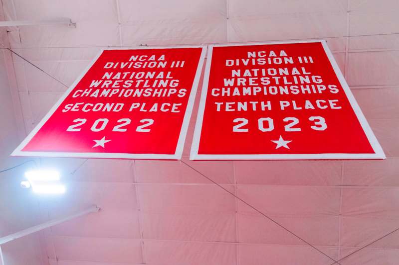a two red banners with white text
