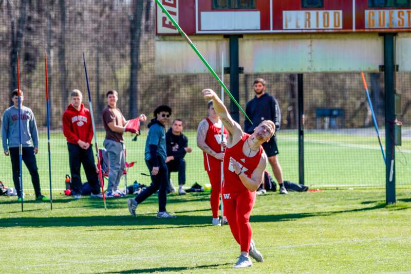 a man throwing a javelin