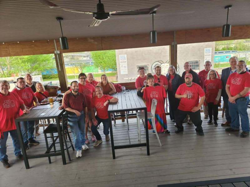 a group of people posing for a photo