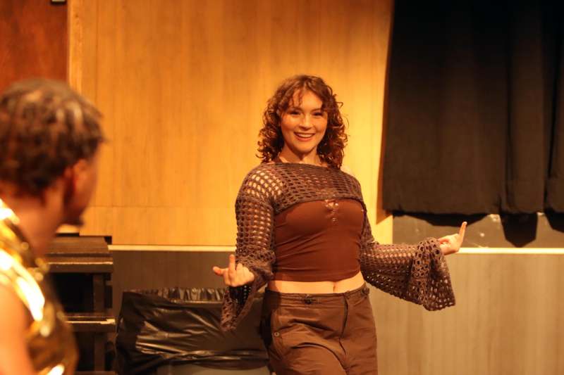 a woman dancing on stage