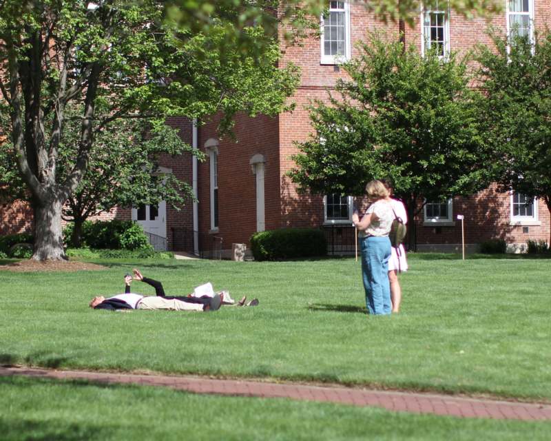 a group of people on a lawn