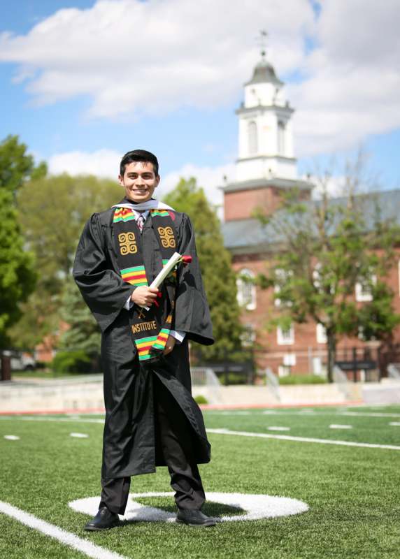 a man in a graduation gown