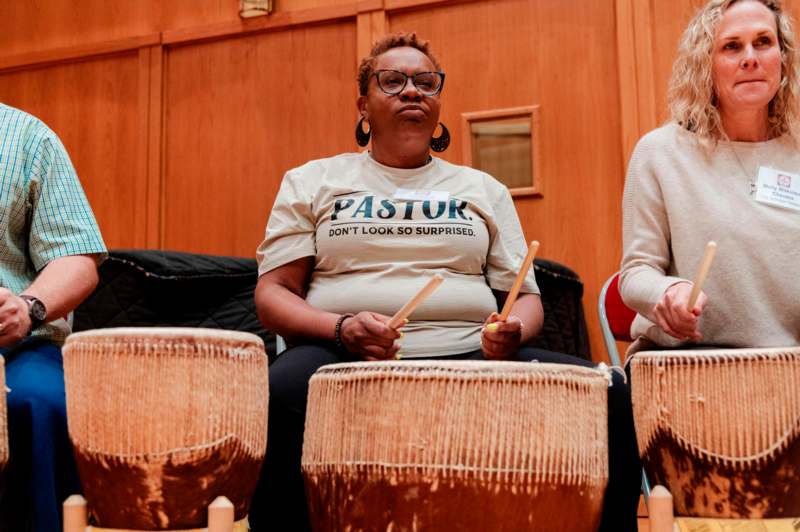 a group of women playing drums