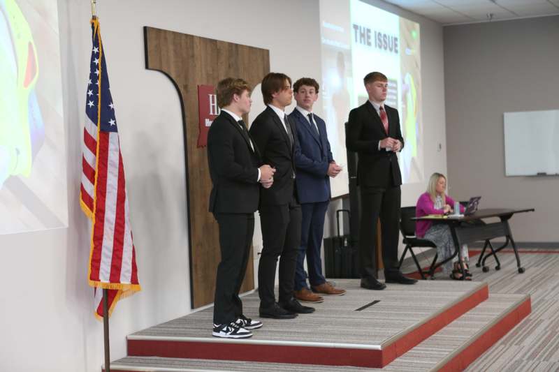 a group of men on a stage