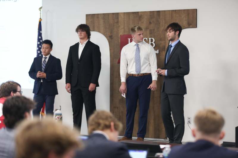 a group of men in suits