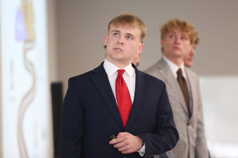 a group of men in suits