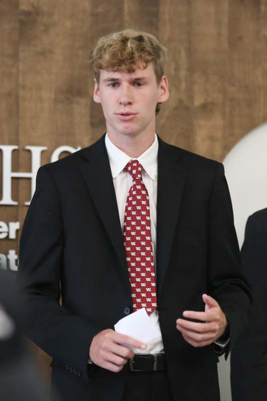 a man in a suit and tie