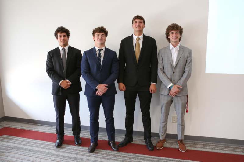 a group of men in suits