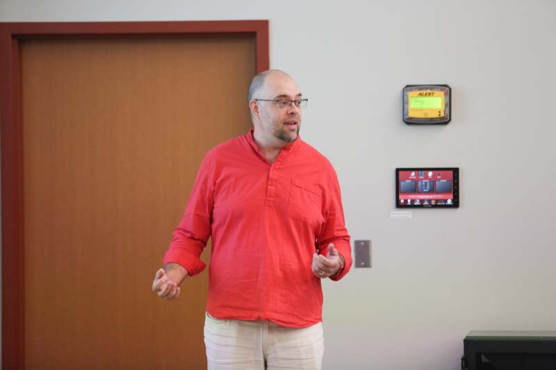 a man in a red shirt