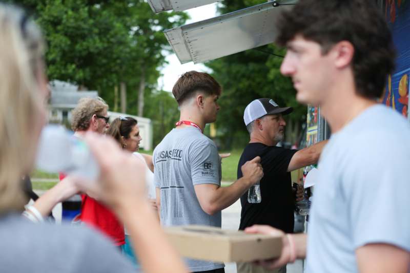 a group of people standing outside