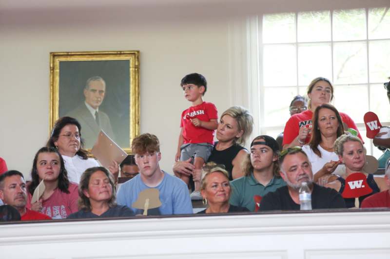 a group of people sitting in a room