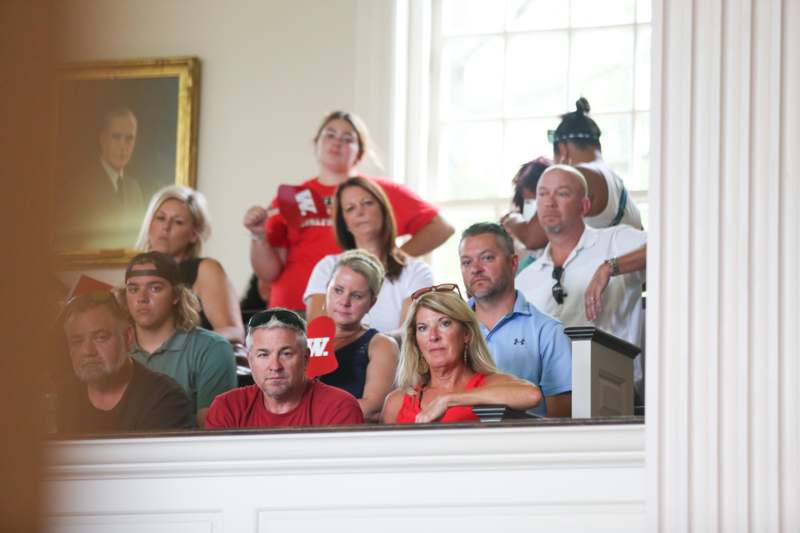 a group of people sitting in a room