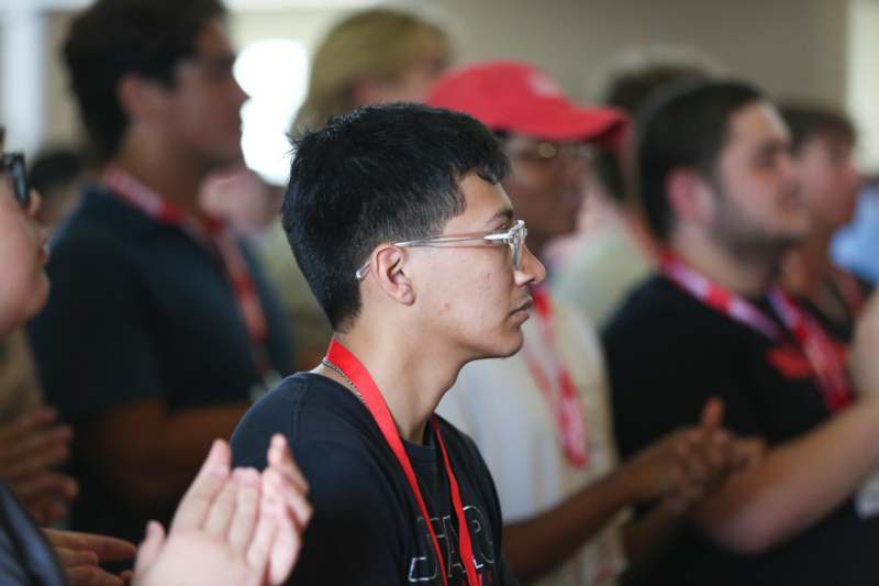 a group of people clapping