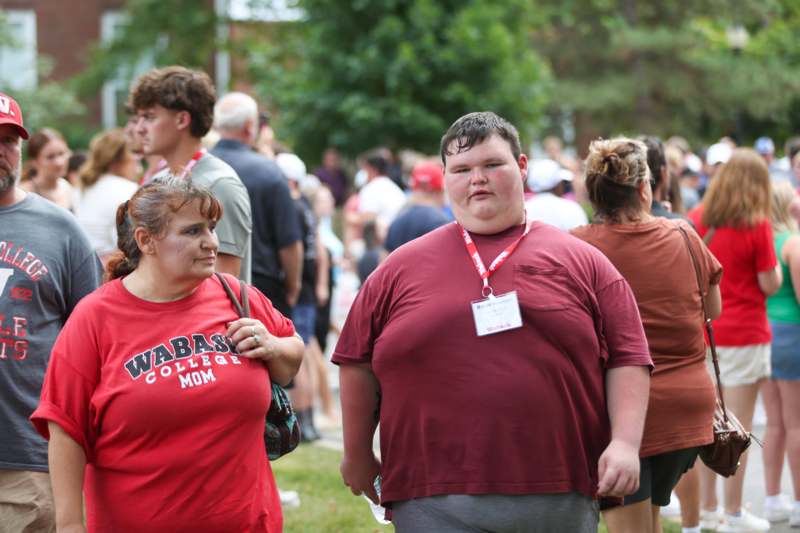 a group of people walking in a crowd