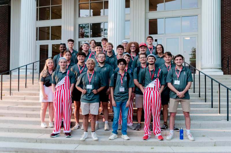 a group of people posing for a photo