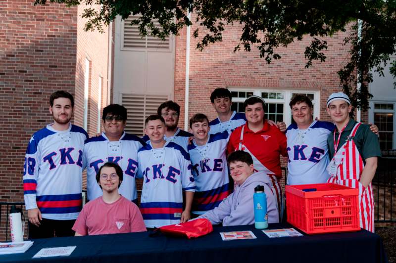 a group of men in sports uniforms