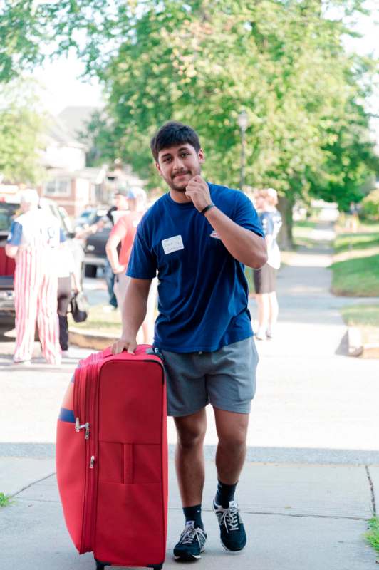 a man with a suitcase