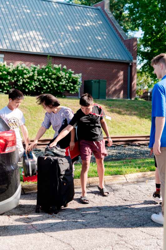 a group of people with luggage