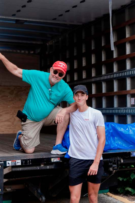 a man and boy posing for a picture