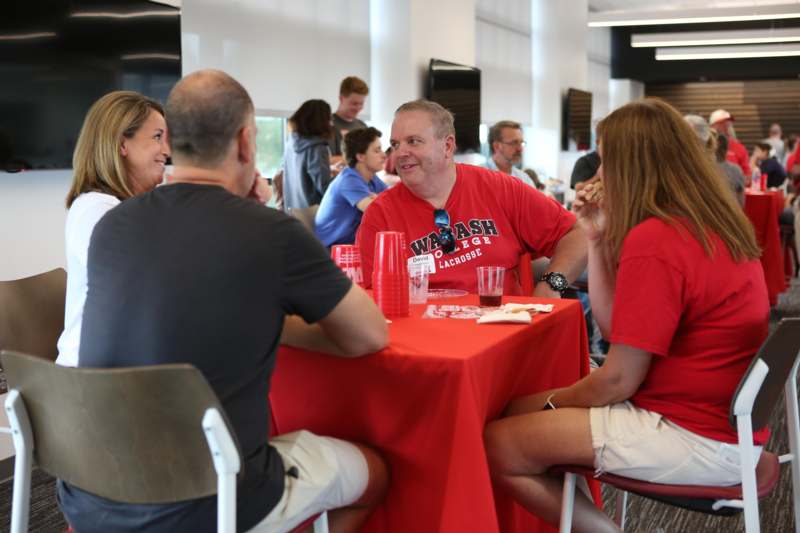 a group of people sitting at a table