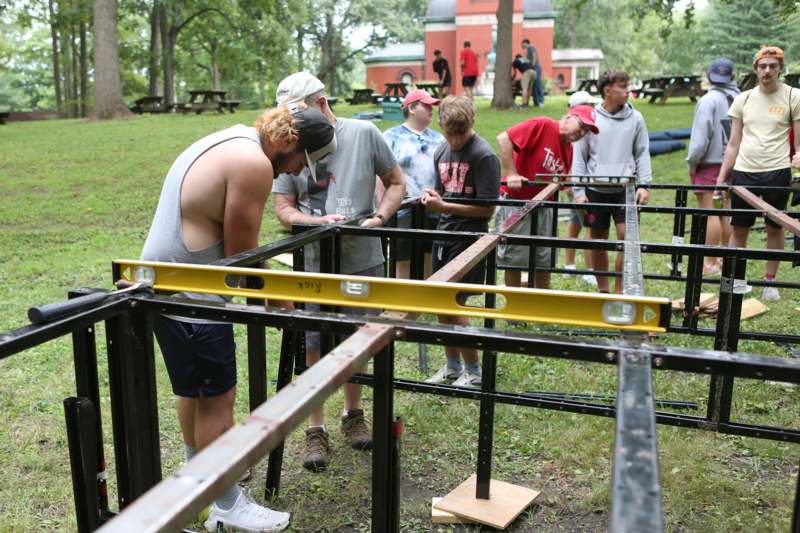 a group of people building a structure