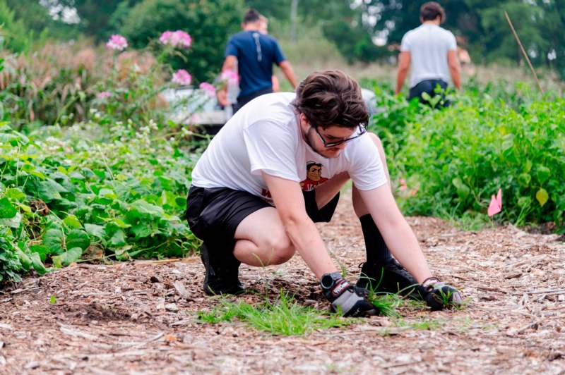 a man kneeling on the ground