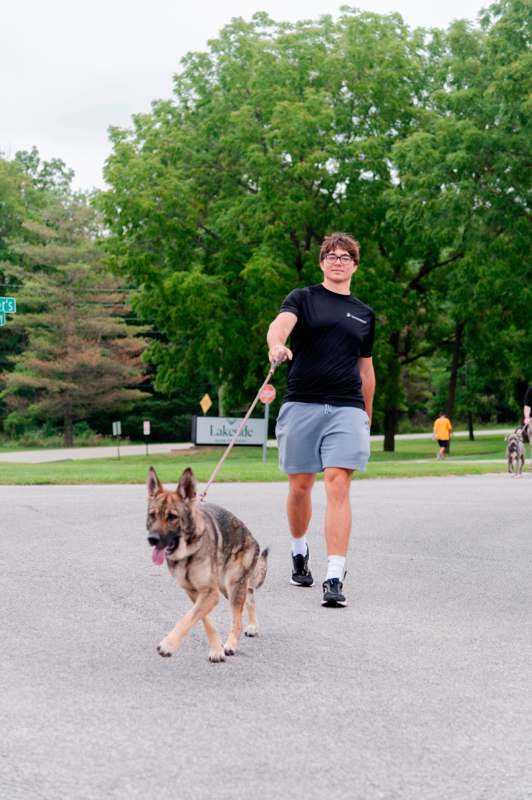 a man walking a dog