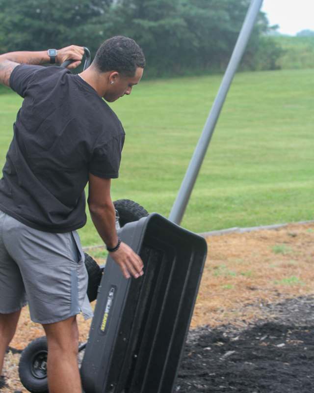 a man pushing a cart