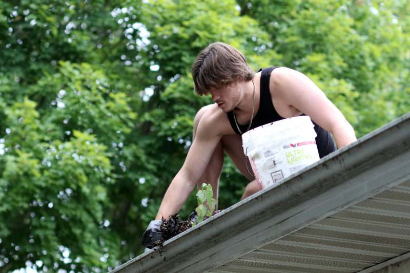 a man on a roof